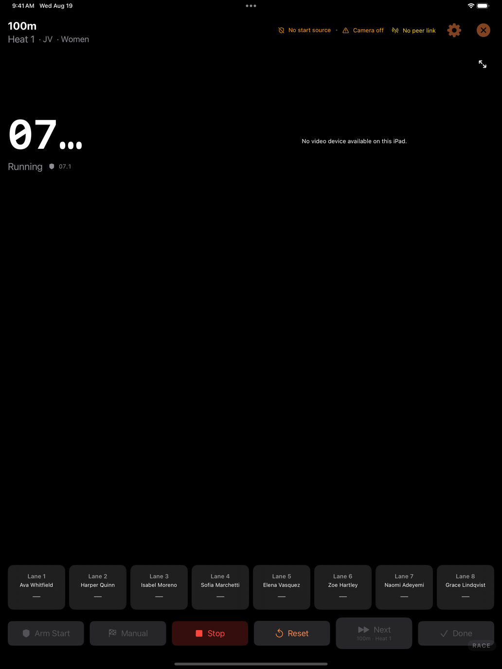 The DM Track Timer live race screen with the clock running and eight lane buttons ready to record finishes