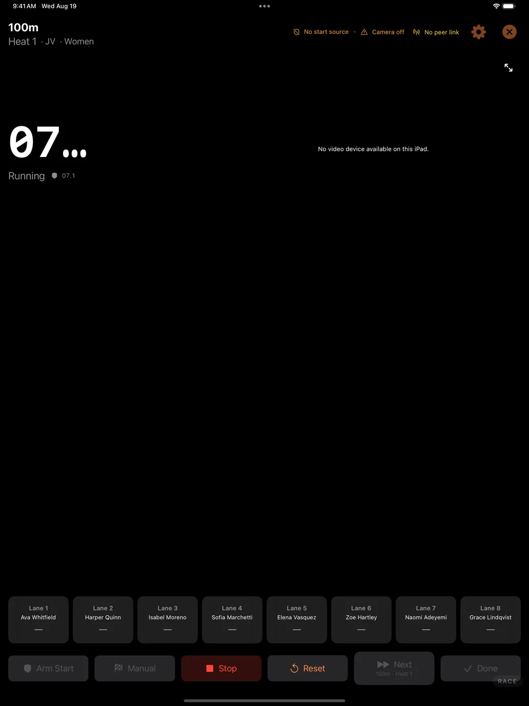 The DM Track Timer live race screen with the clock running and eight lane buttons ready to record finishes