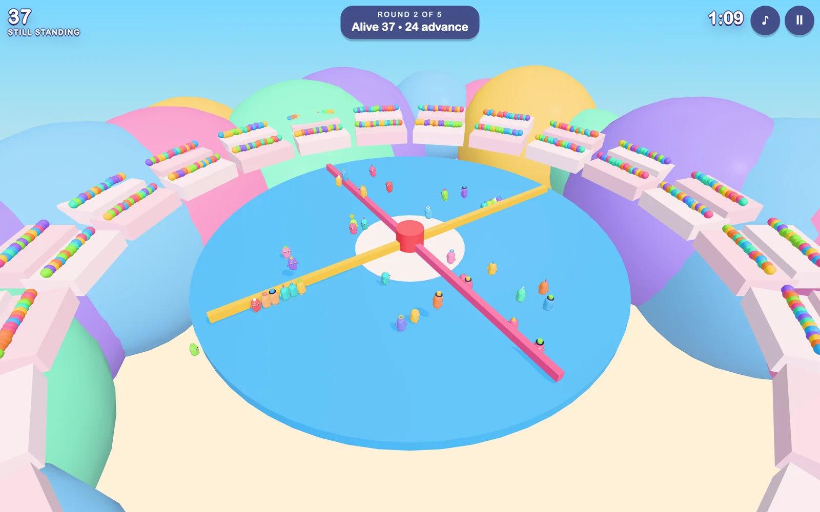 The Sweeper Sprinkles round: beans on a large blue disc with two spinning arms sweeping across it