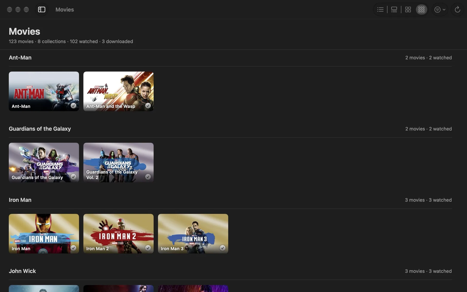 DM TV Library's Movies page with films grouped into collections